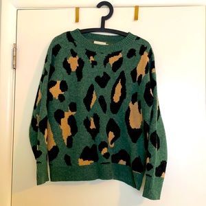 Green and tan leopard print sweater.